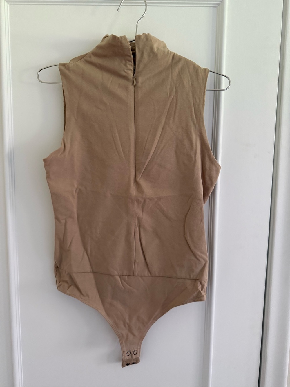Aritzia Sleeveless Zip-Back Bodysuit in Tan